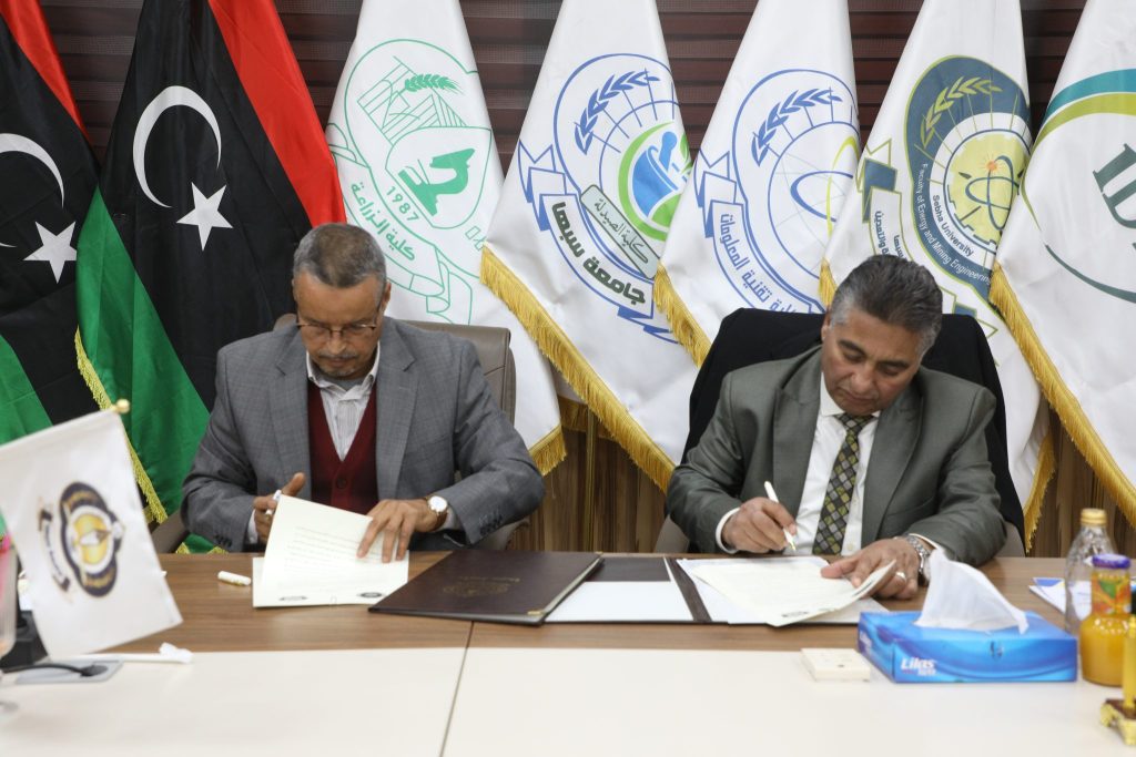 توقيع اتفاقية تعاون علمي مشترك بين جامعة سبها و جامعة صبراته - مكتب ...