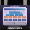 Stage with a projector screen displaying an Arabic infographic on social services, framed by dark curtains.